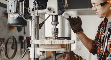 Carpenter working with circular saw